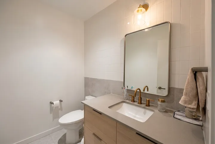 Around the House — bathroom with brass fixtures