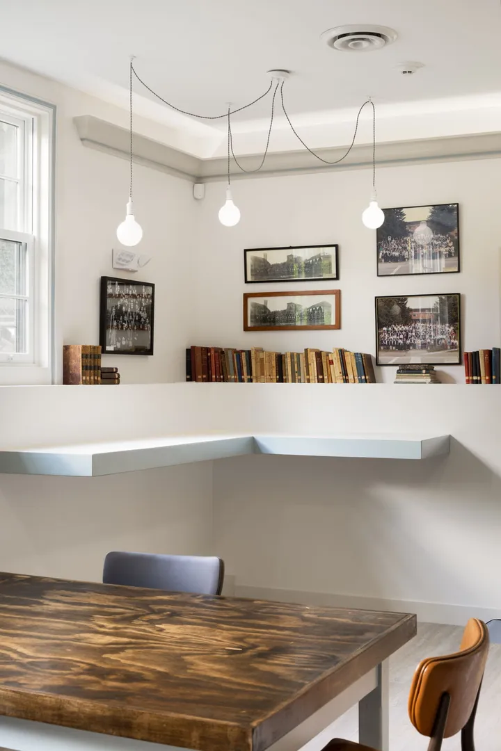 Church Community Space — gallery wall above bookshelf